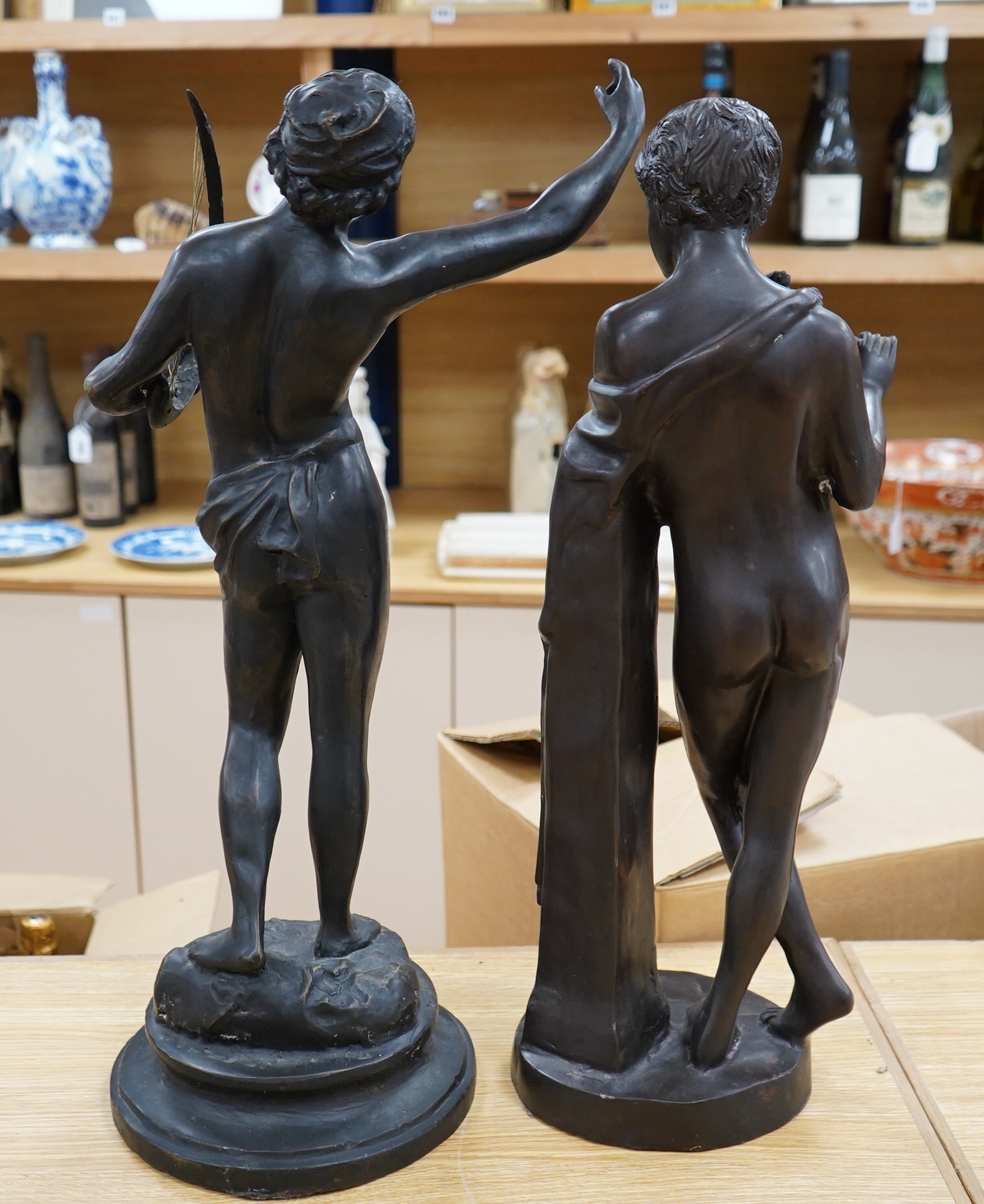 After the Antique, two spelter figures including a faun, largest 66cm high. Condition - fair.